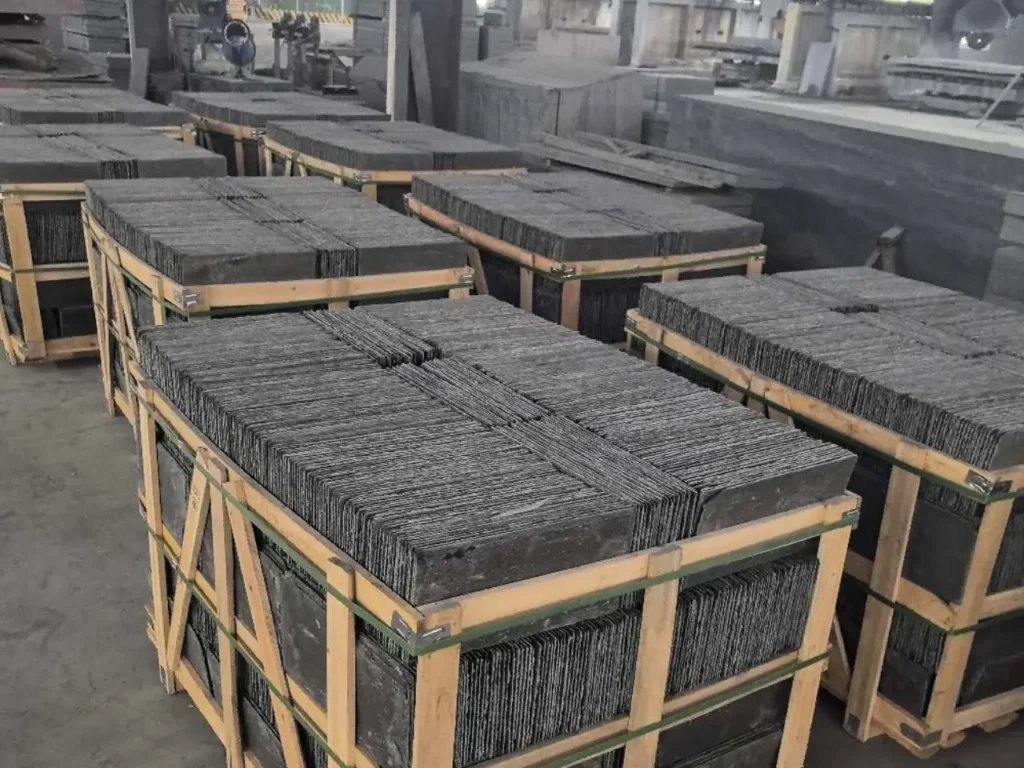 Natural roofing slate tiles packed in reinforced wooden crates at our factory in Jiujiang, China