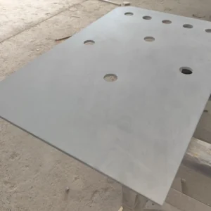 Custom bar billiards table slate placed on a worktable for inspection