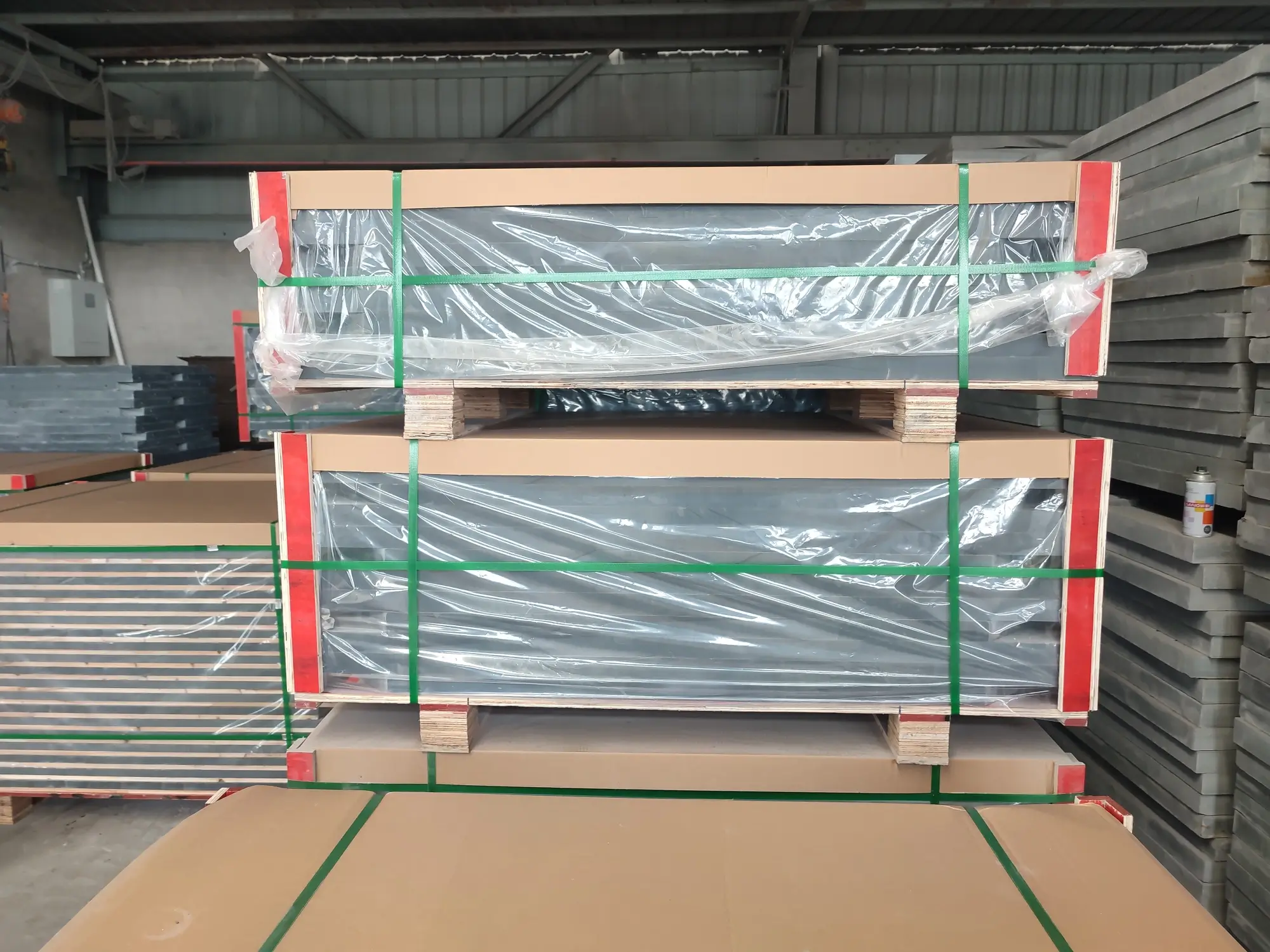 Billiard Slate Export Packing Reinforced wooden export crates for heavy slate panels standing on a factory loading yard