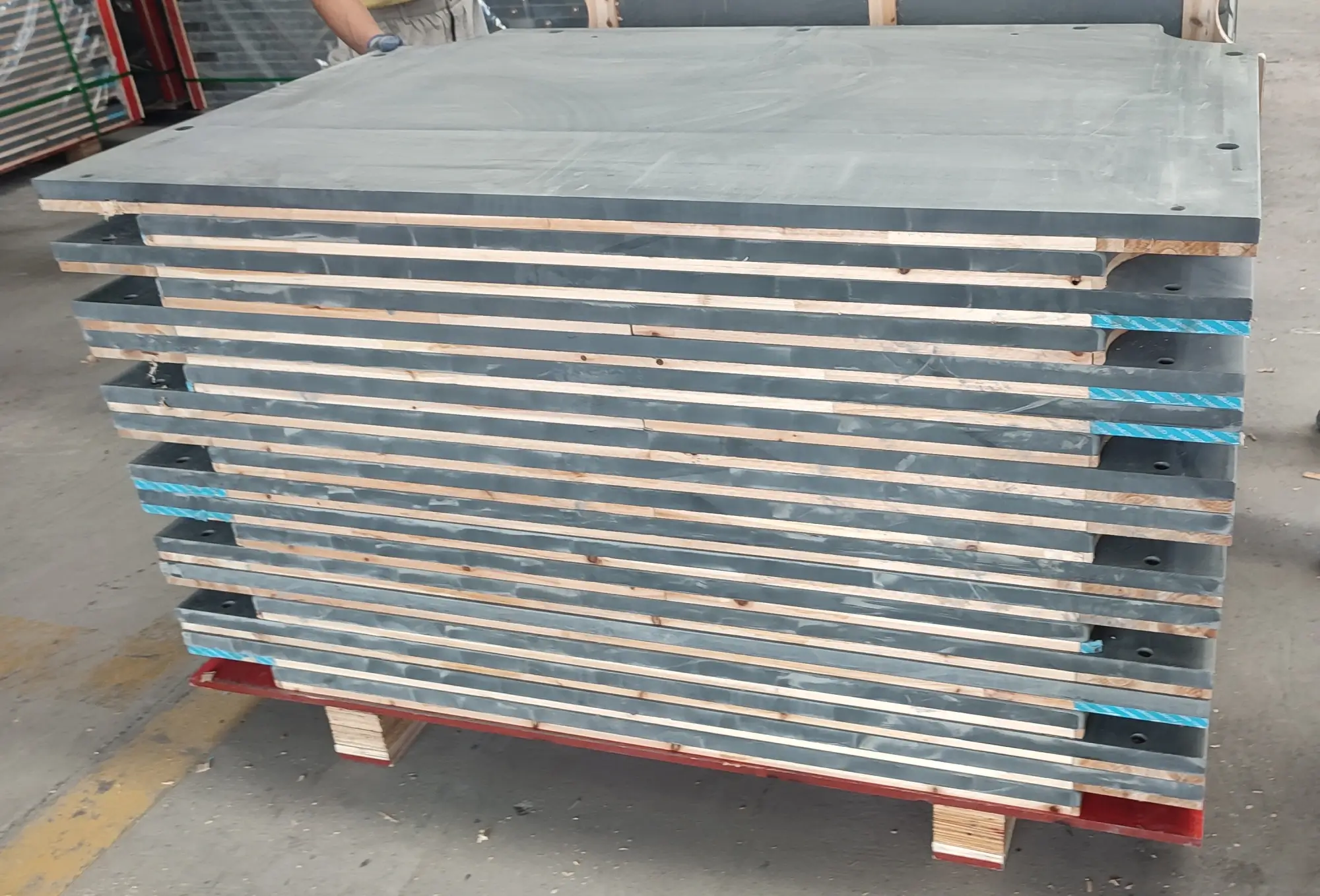 Billiard Slate Thickness Consistency Side view of a stack of finished slate panels with identical thickness and machined edges perfectly aligned
