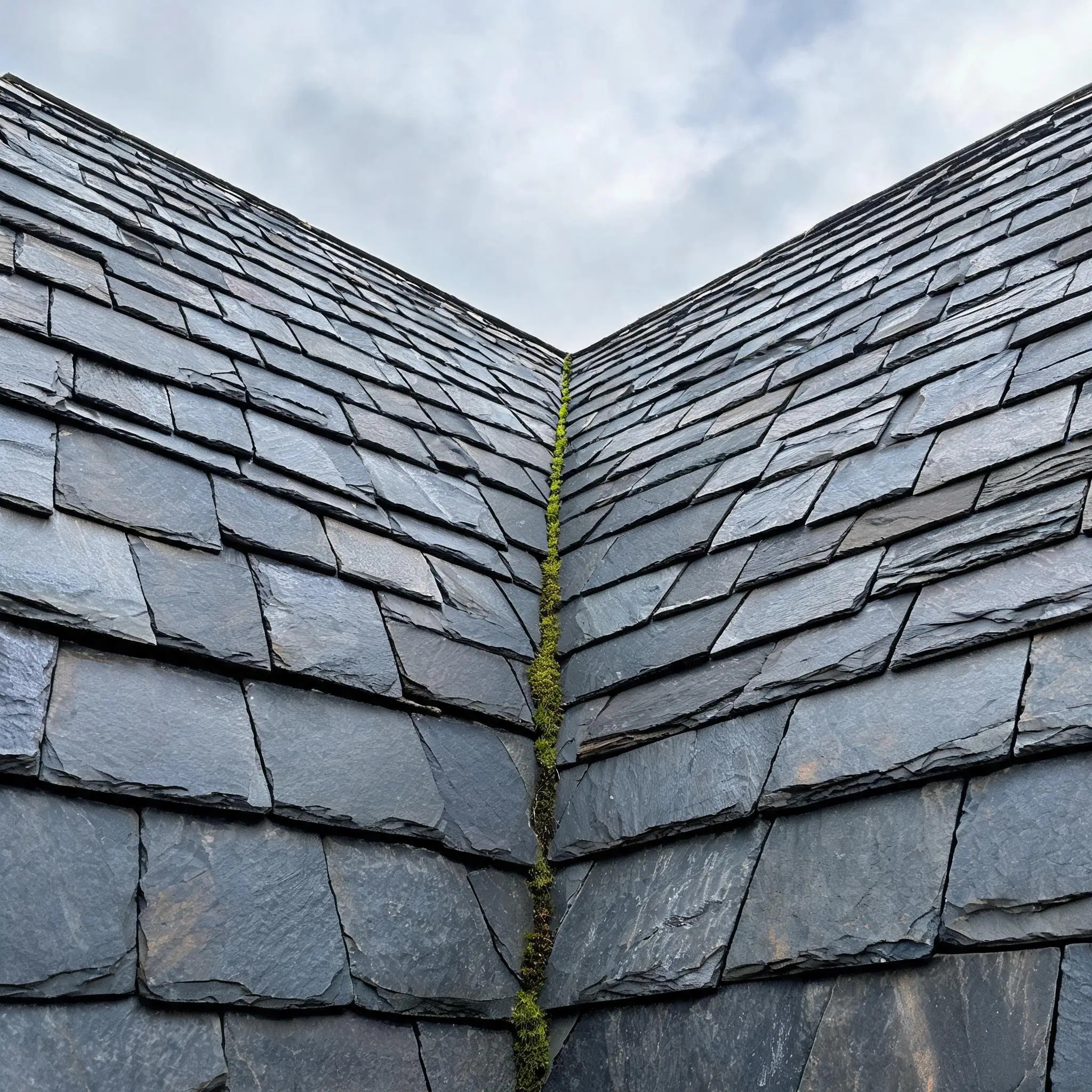 EN 12326 and ASTM C406: What They Test 6 natural slate roof with two slopes meeting at a valley line