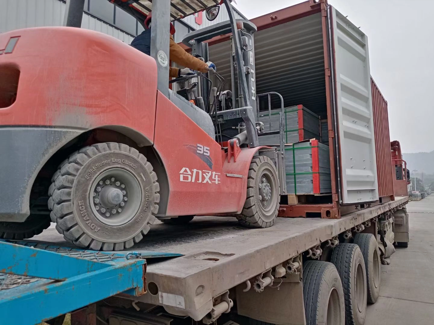 Why Jiujiang Slate Is Famous Worldwide 2 Export containers being loaded with wooden crates of Jiujiang slate at the factory before trucking to Jiujiang port