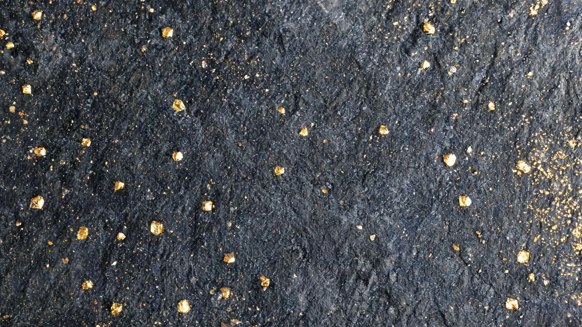 Golden pyrite crystals scattered like stars on polished dark grey Jiujiang slate, the famous gold-star effect of the region's slate