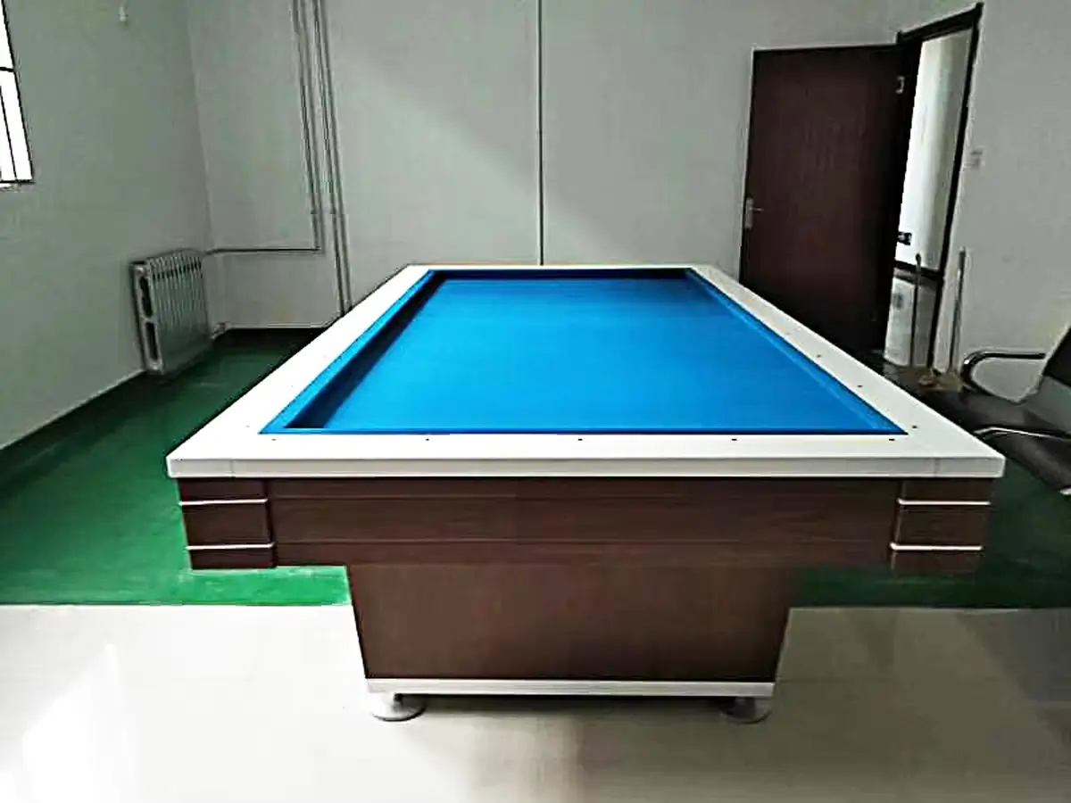 Korean Carom Table Slate 5 Finished pocketless carom table with blue cloth in a Korean billiard hall