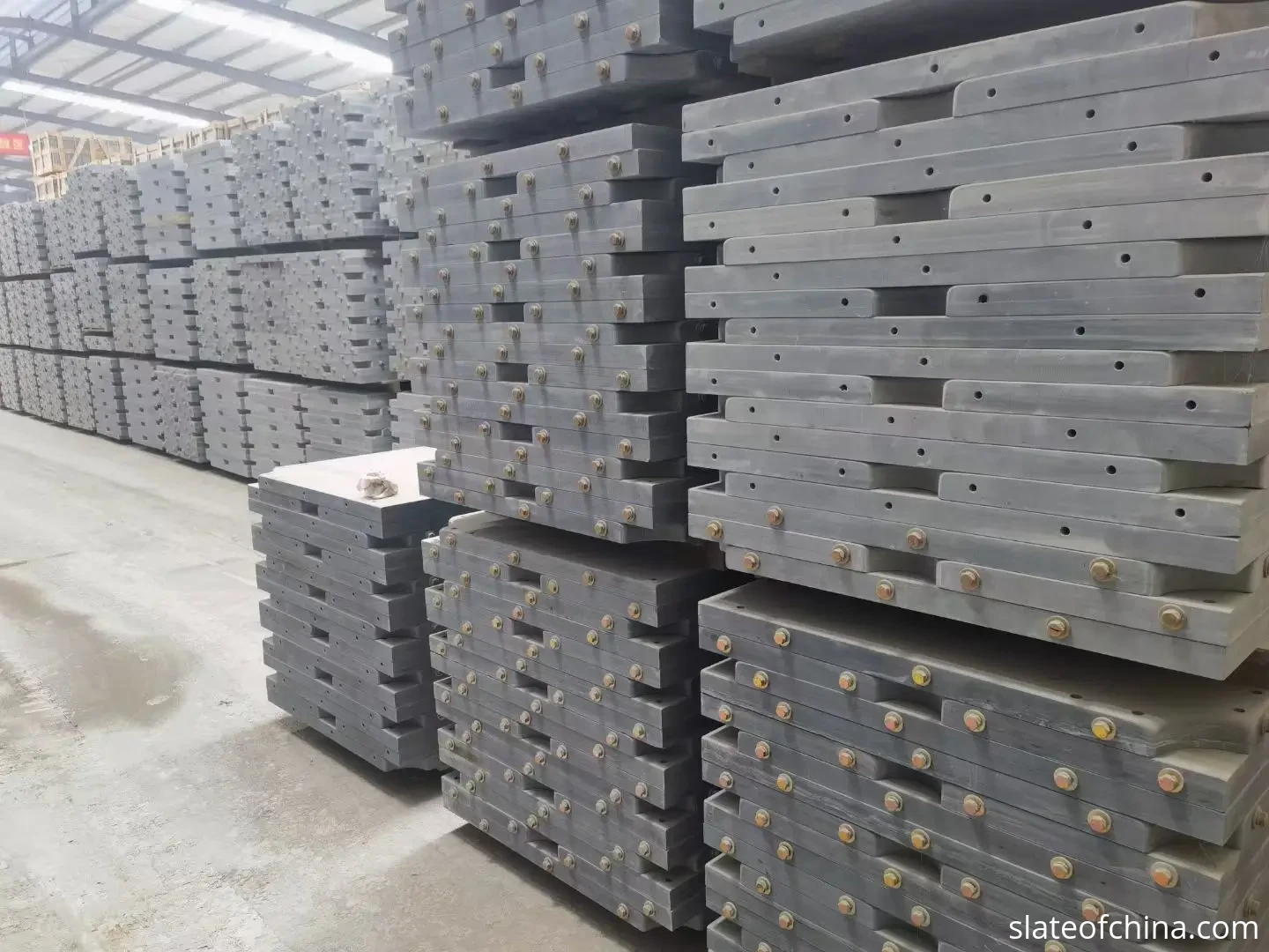 OEM Billiard Slate for Table Manufacturers 4 Multiple finished billiard slate sets arranged in rows in a factory warehouse, showing batch-to-batch consistency