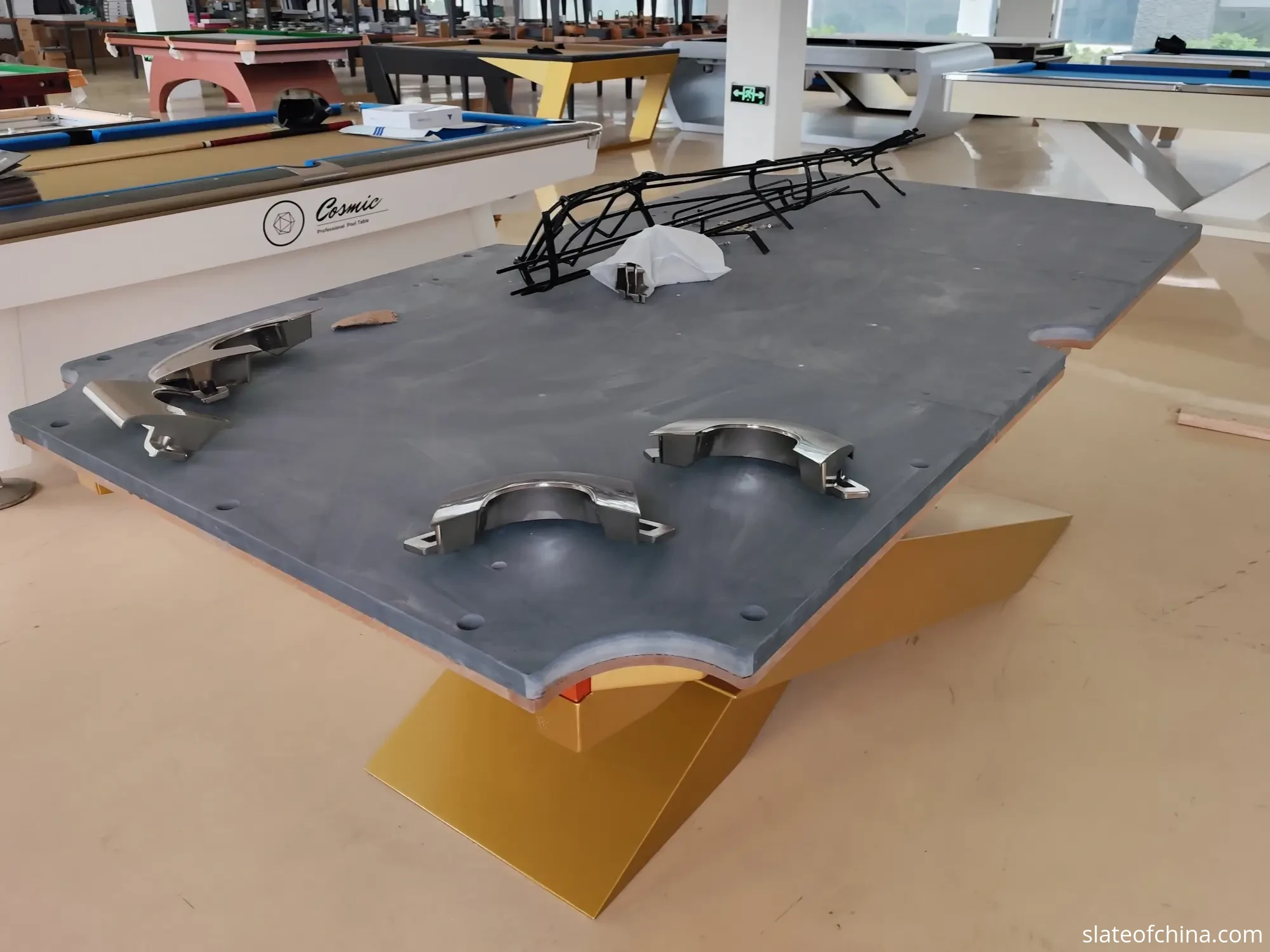 OEM Billiard Slate for Table Manufacturers 3 Three-piece billiard slate set placed on a table frame for trial assembly, checking joint alignment and bolt-hole positions