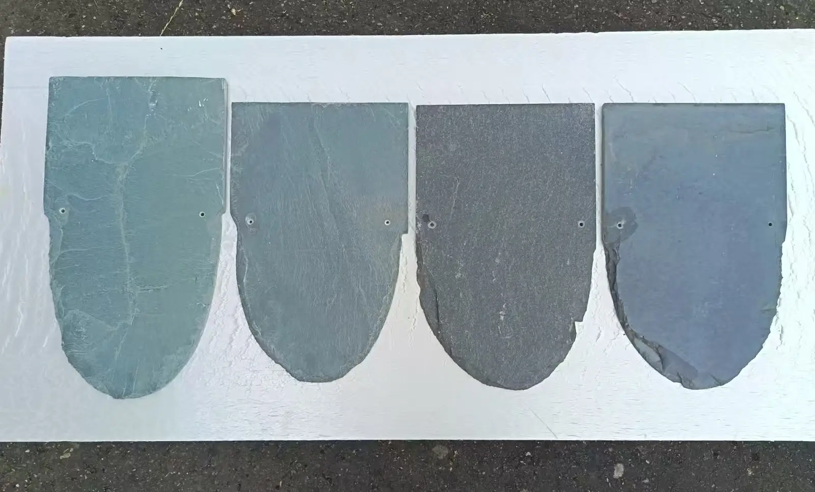 Why Roofing Buyers Choose Jiujiang Slate 1 Natural roofing slate samples in five colours: charcoal black, dark grey, silver grey, green and rusty brown