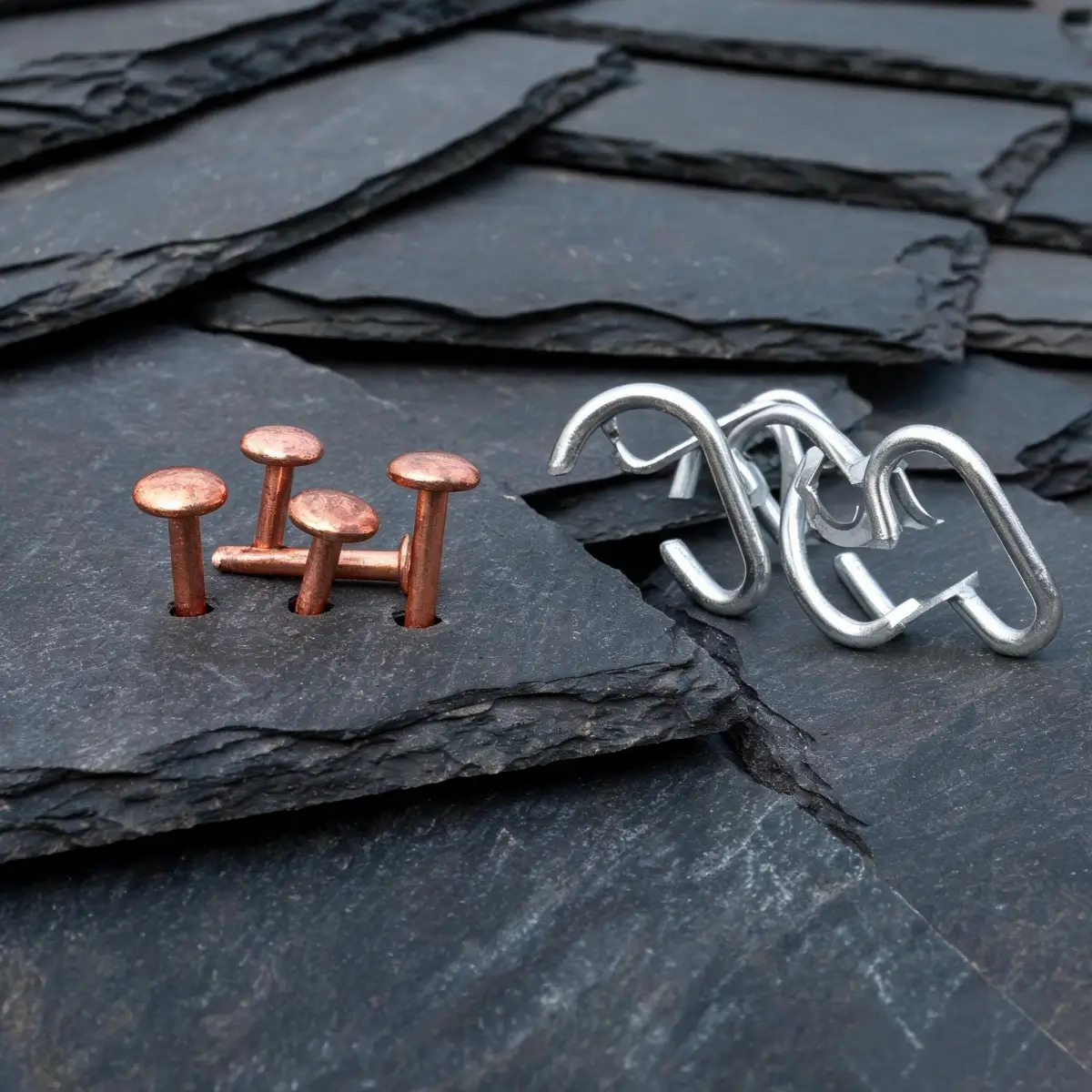 Roofing Slate FAQ 4 Copper nails and stainless steel slate hooks used for fixing roofing slate