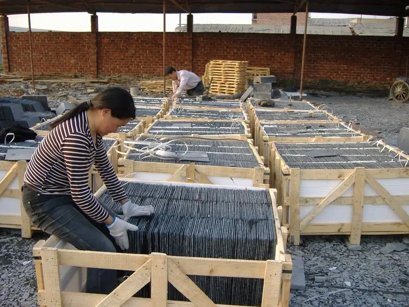 How to Source Jiujiang Slate Directly 5 Wooden export crates packed with roofing slate stacked in a factory loading area