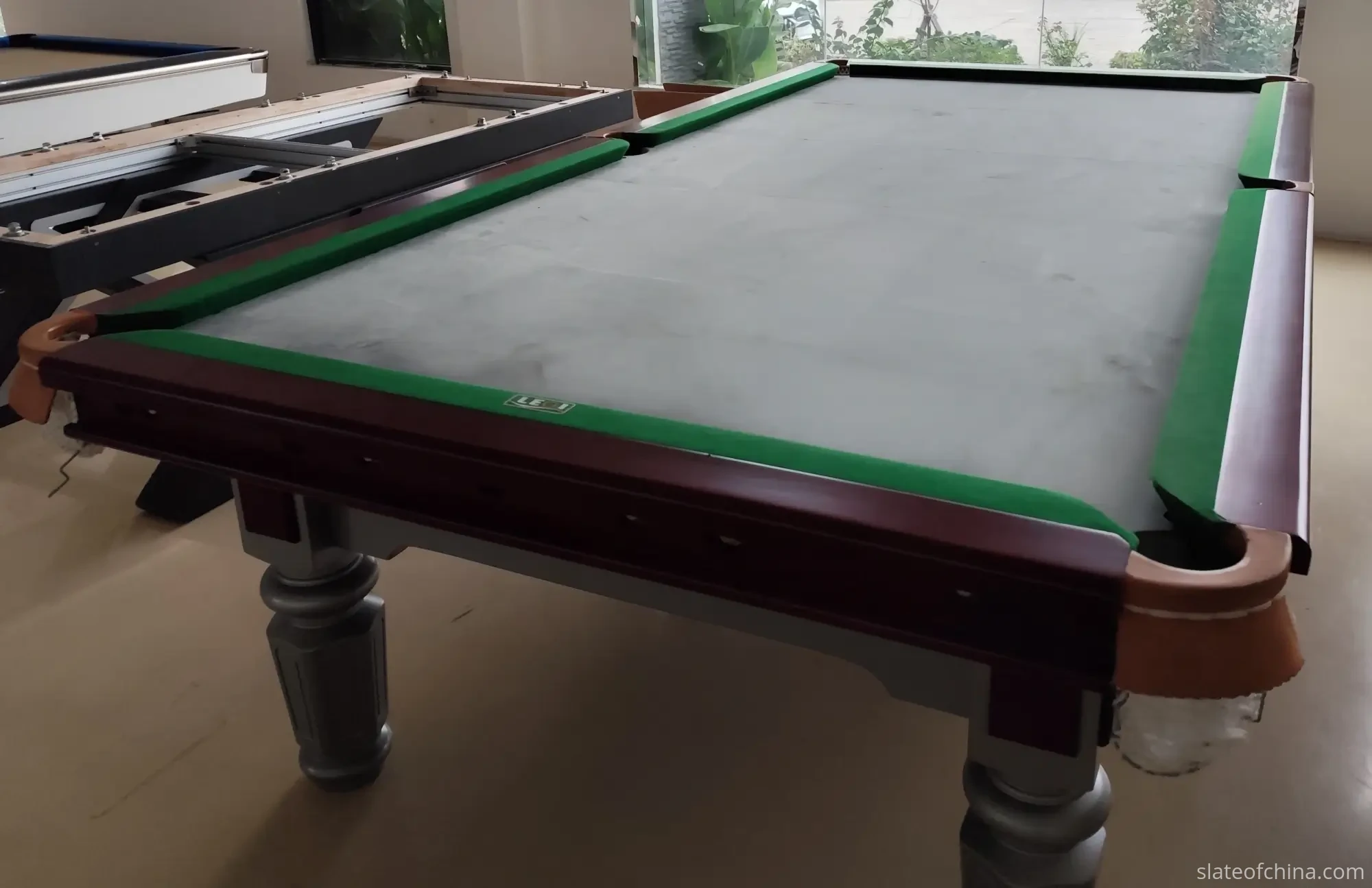 Pool vs Snooker vs Chinese 8-Ball Slate Thickness: 25mm, 45mm and 50mm 6 Billiard slate bed resting on the wooden cross-beam frame of a table under assembly