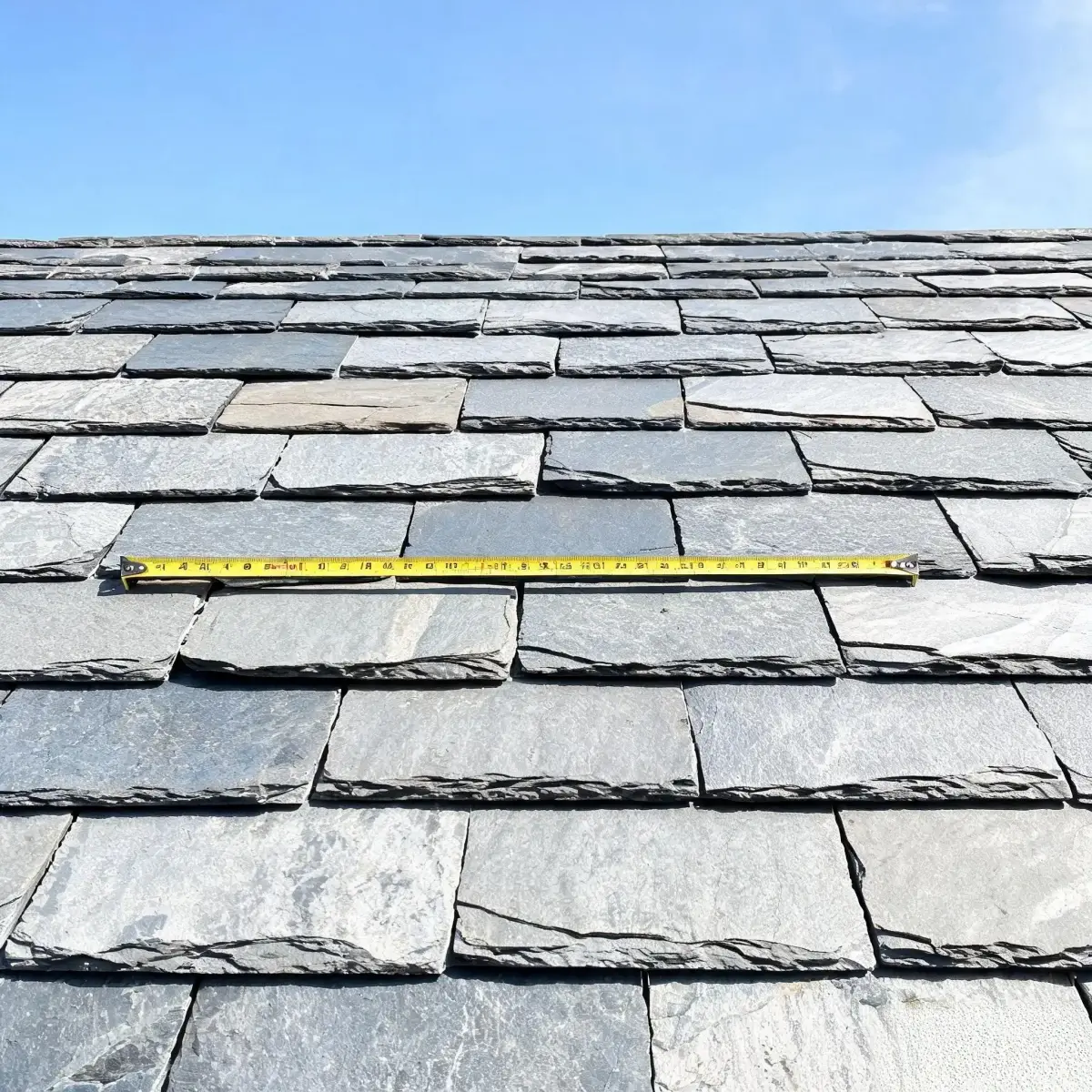 Roofing Slate Technical Data 5 roofing slate coverage rows on a roof showing slates per square metre for different sizes