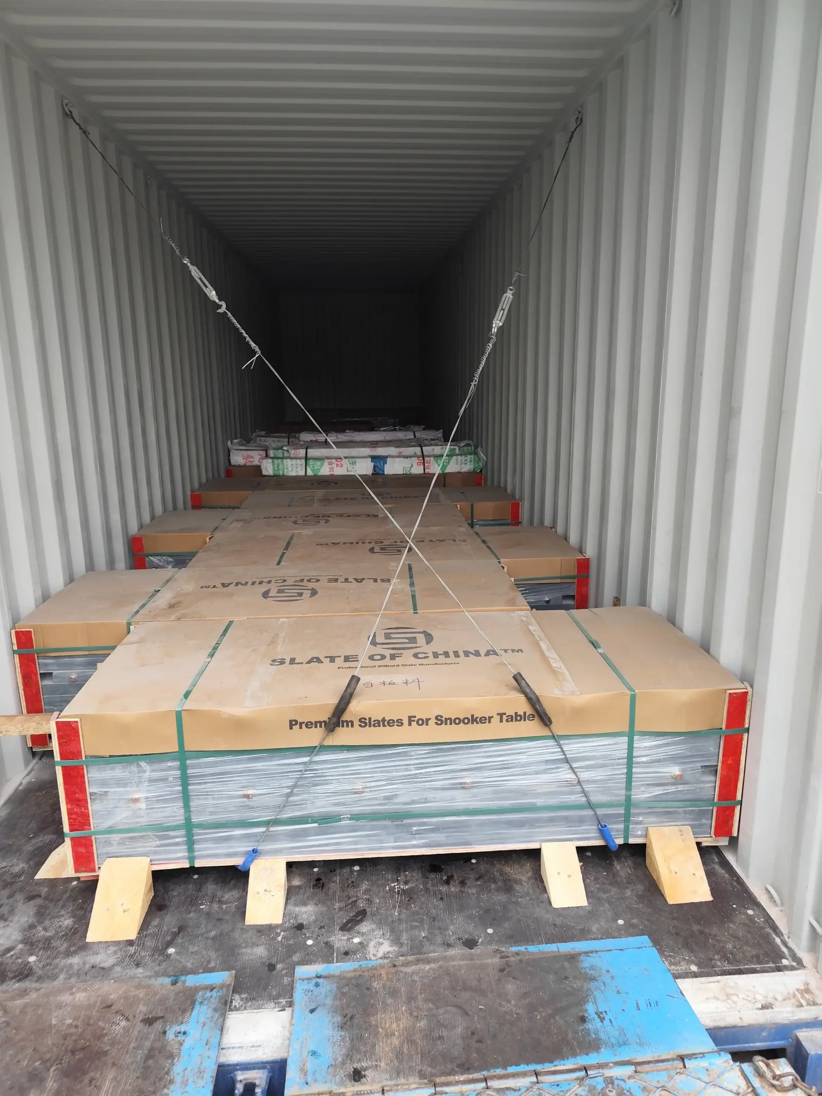 How to Verify a Jiujiang Slate Supplier 6 Wooden slate crates secured with dunnage air bags and timber bracing inside a shipping container