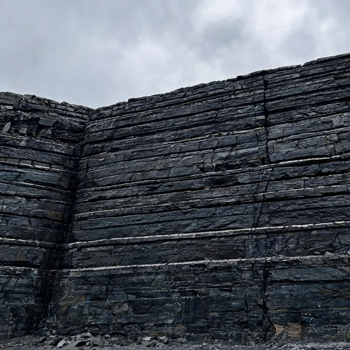 Slate quarry geological formation showing layered rock strata