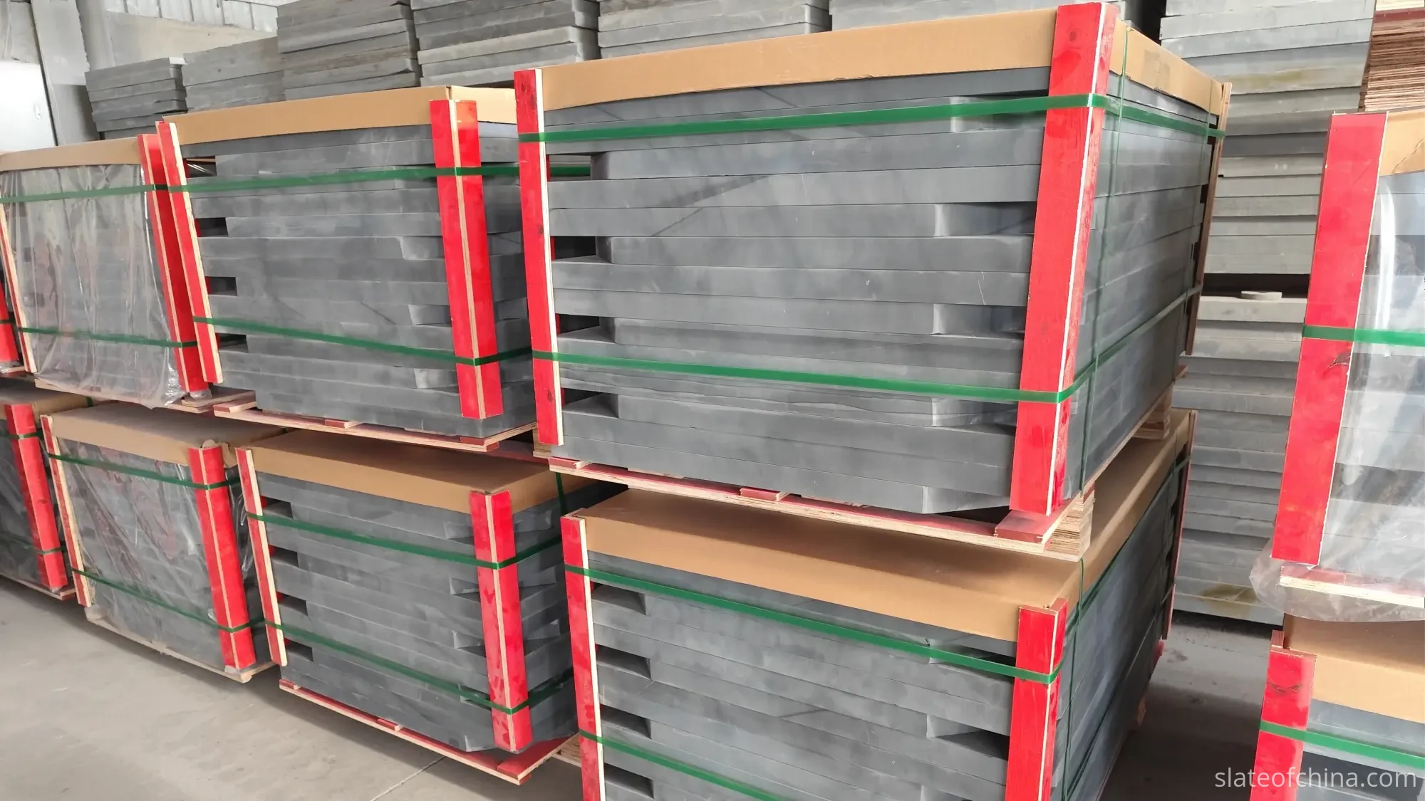 OEM Billiard Slate Manufacturing Process 5 Finished billiard slate panels packed on wooden pallets with green strapping, red corner protectors and cardboard padding for export