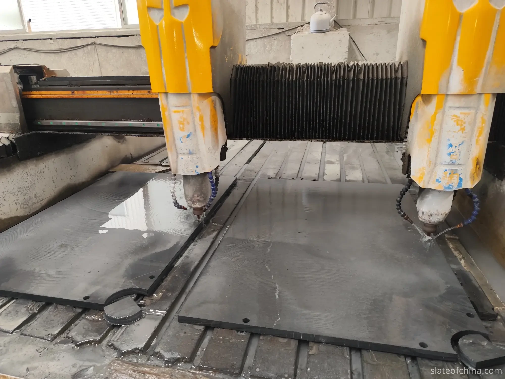 CNC Pocket and Hole Machining — Billiard Slate Production Process Twin-spindle CNC machining centre milling pocket openings and drilling mounting holes into two billiard slate panels