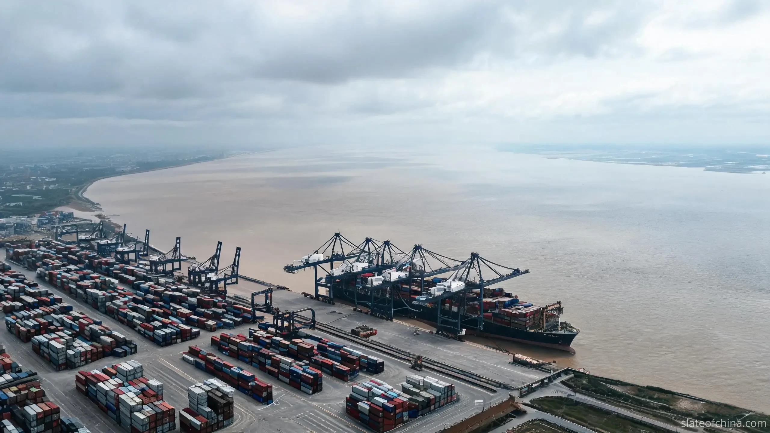 Yangtze River port at Shanghai where river feeder containers connect to ocean vessels for billiard slate exports