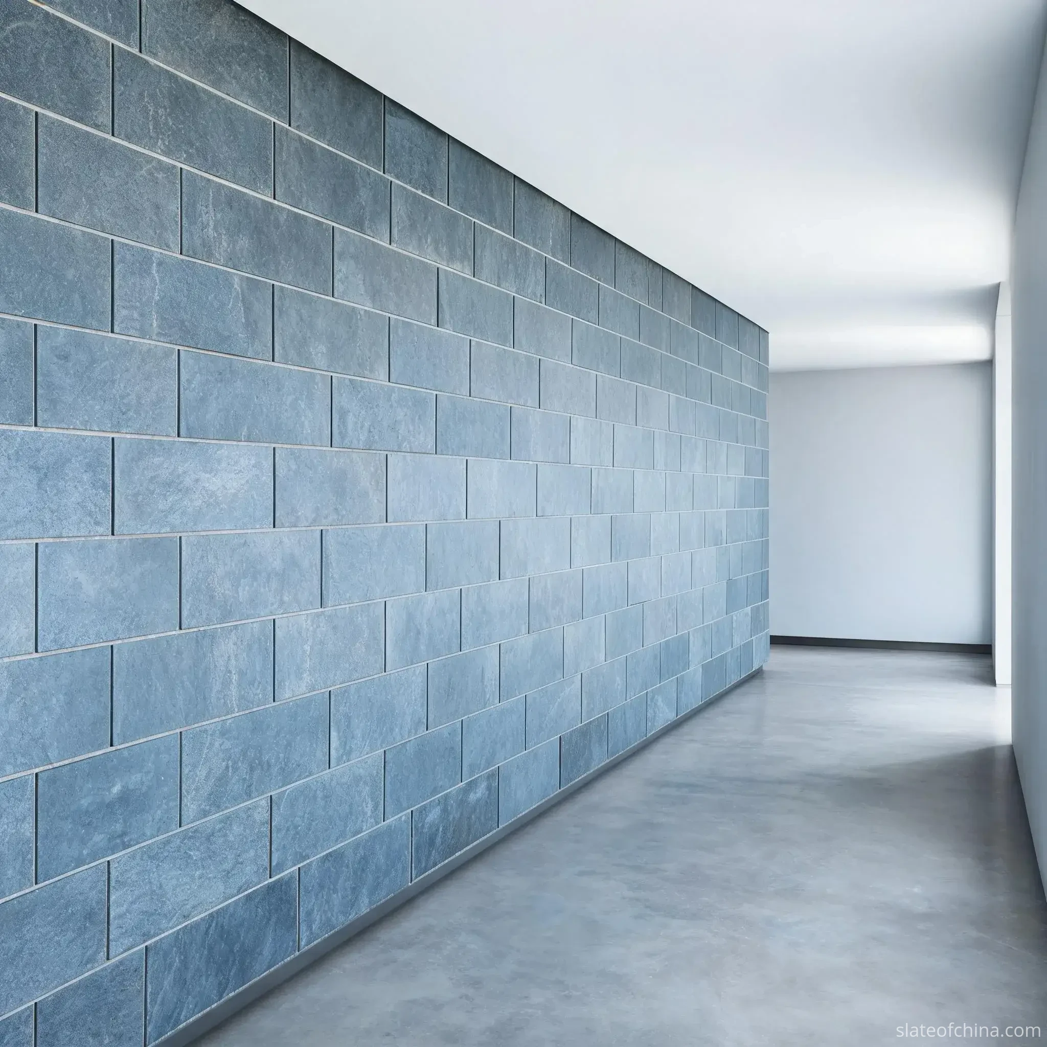 Exterior vs Interior Slate Cladding 3 Modern interior feature wall in flat calibrated slate panels with straight sawn edges and consistent tight joints