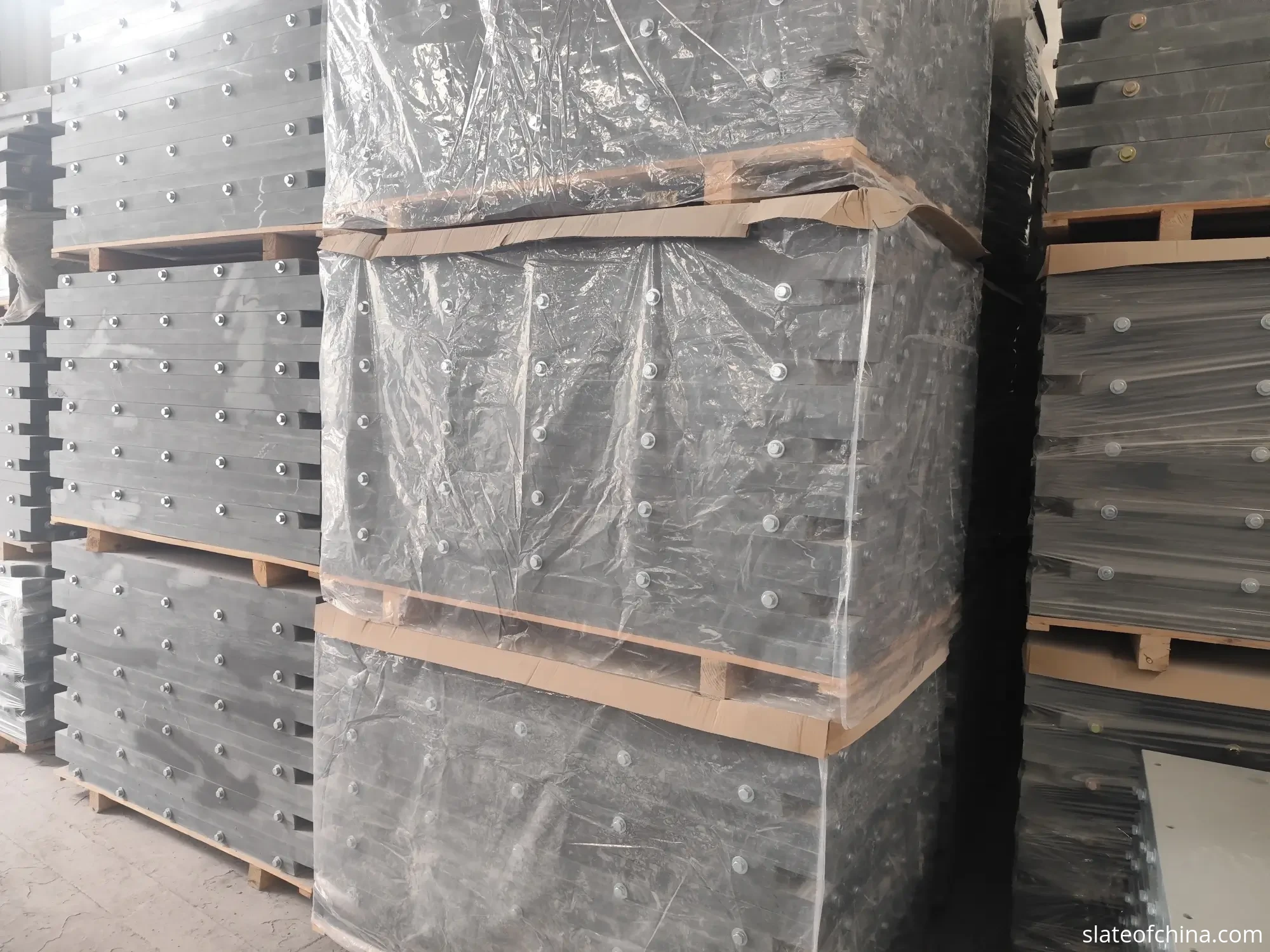 Custom Billiard Slate Manufacturing 4 Custom wooden export crates being prepared for billiard slate panels in a factory packing area