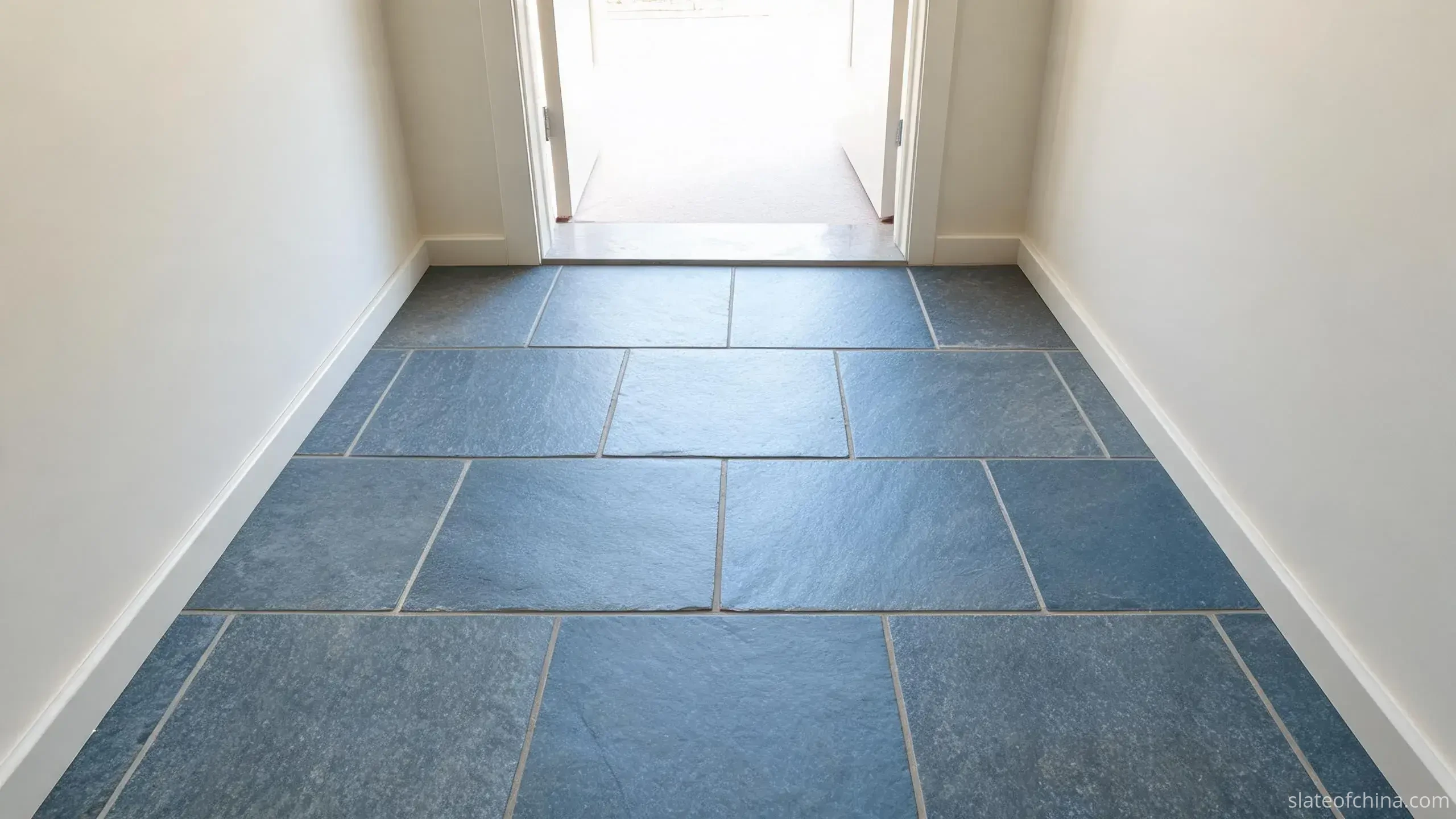Jiujiang Slate Paving & Flooring 3 Indoor entrance hall floored with honed blue-grey slate tiles, soft daylight, clean-cut rectangular format