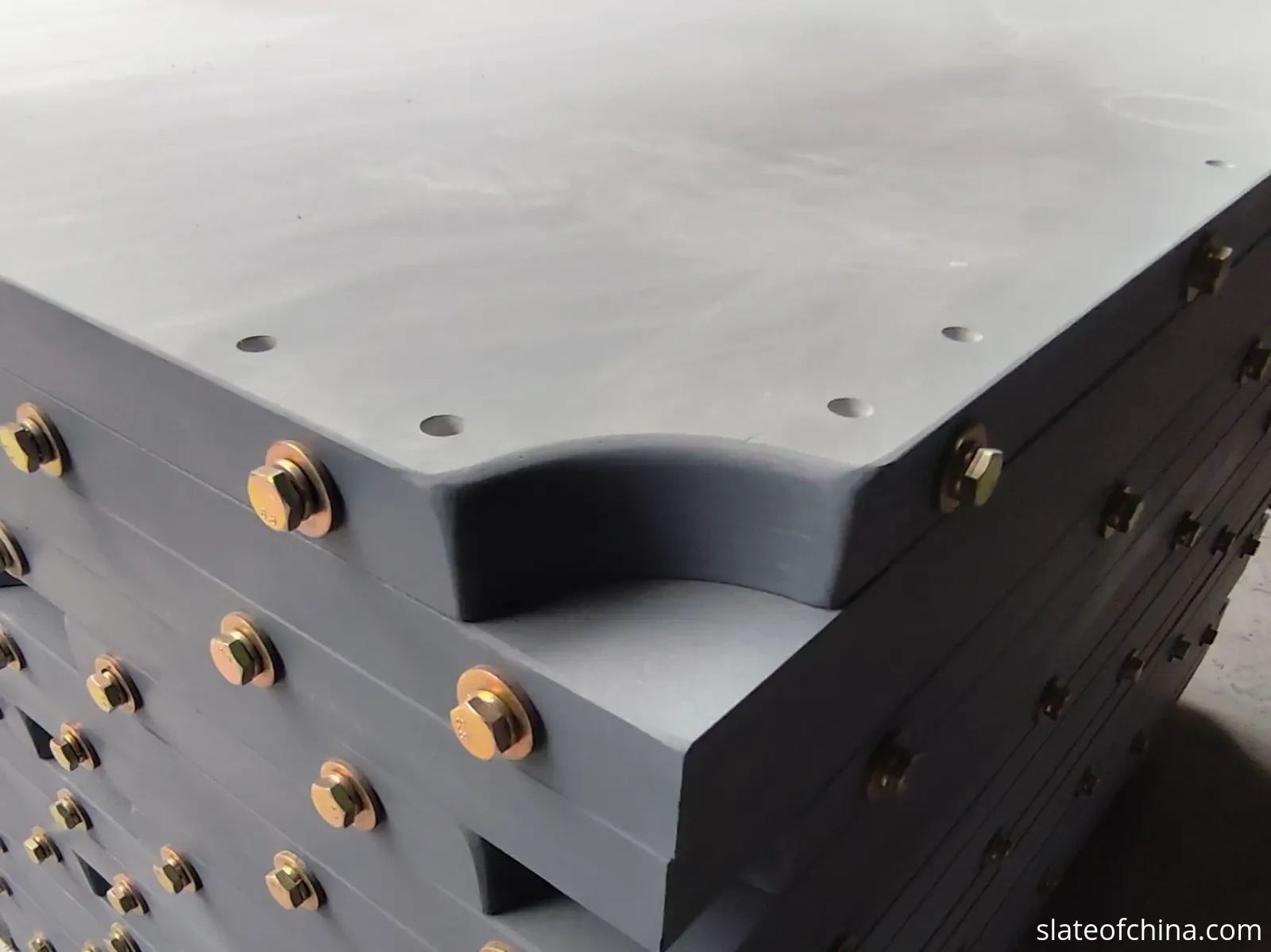 How to Choose Billiard Slate 5 Billiard slate pocket cutout with mounting holes and bolts on a finished stacked panel