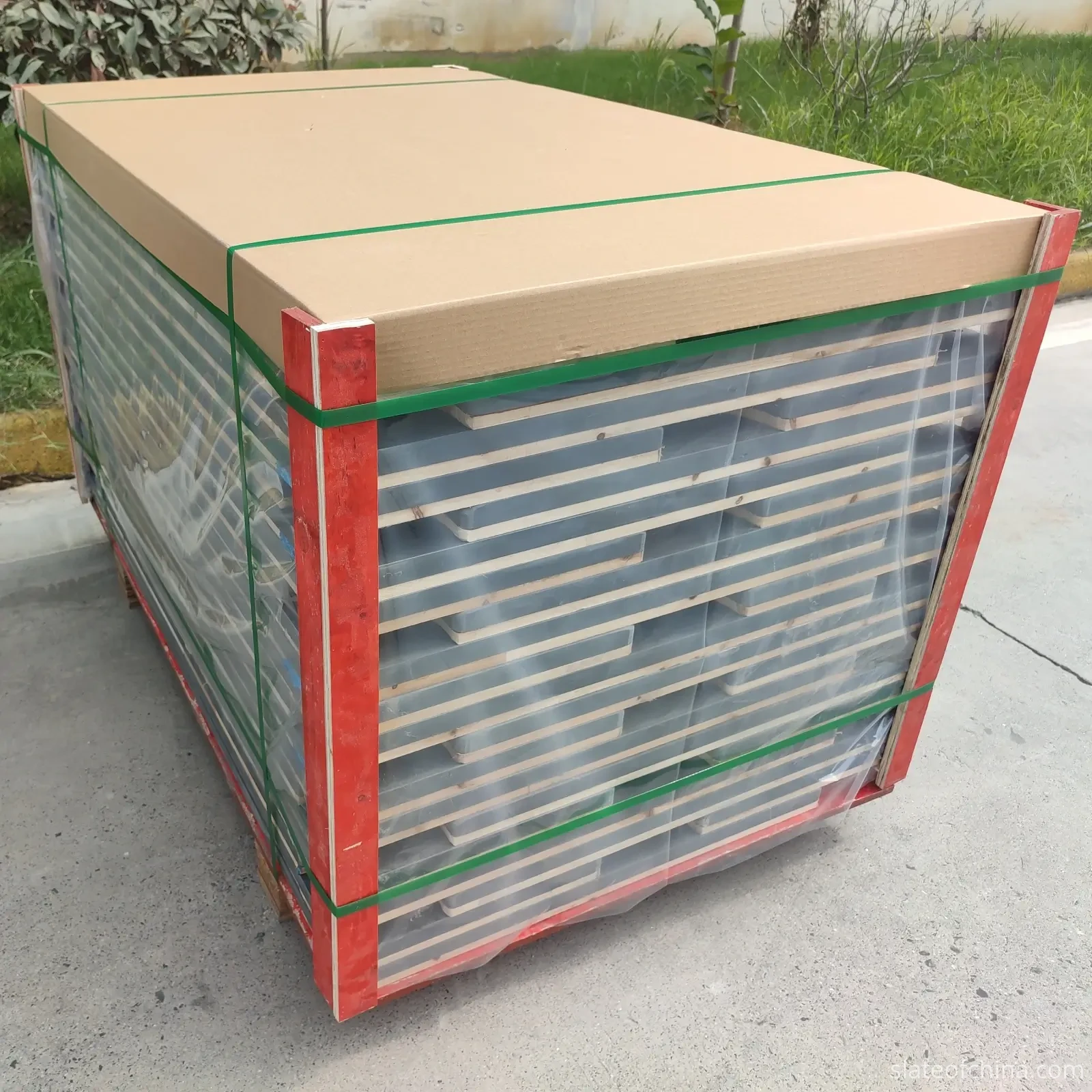 Replacement Slate for Existing Billiard Tables 6 Packed stack of billiard slate panels on a wooden pallet, protective interleaving between layers, braced corners, stretch wrap and strapping, ready for shipping