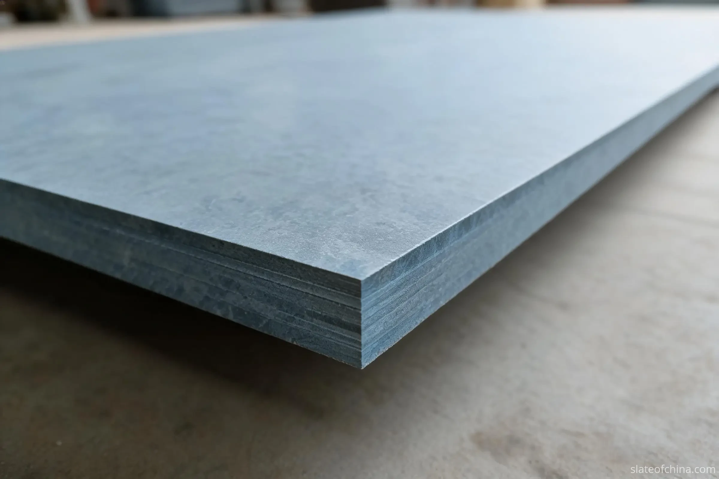 Replacement Slate for Existing Billiard Tables 3 Close-up of the corner of a billiard slate panel, the thick cut edge showing the natural layering of the stone against the honed matte top surface