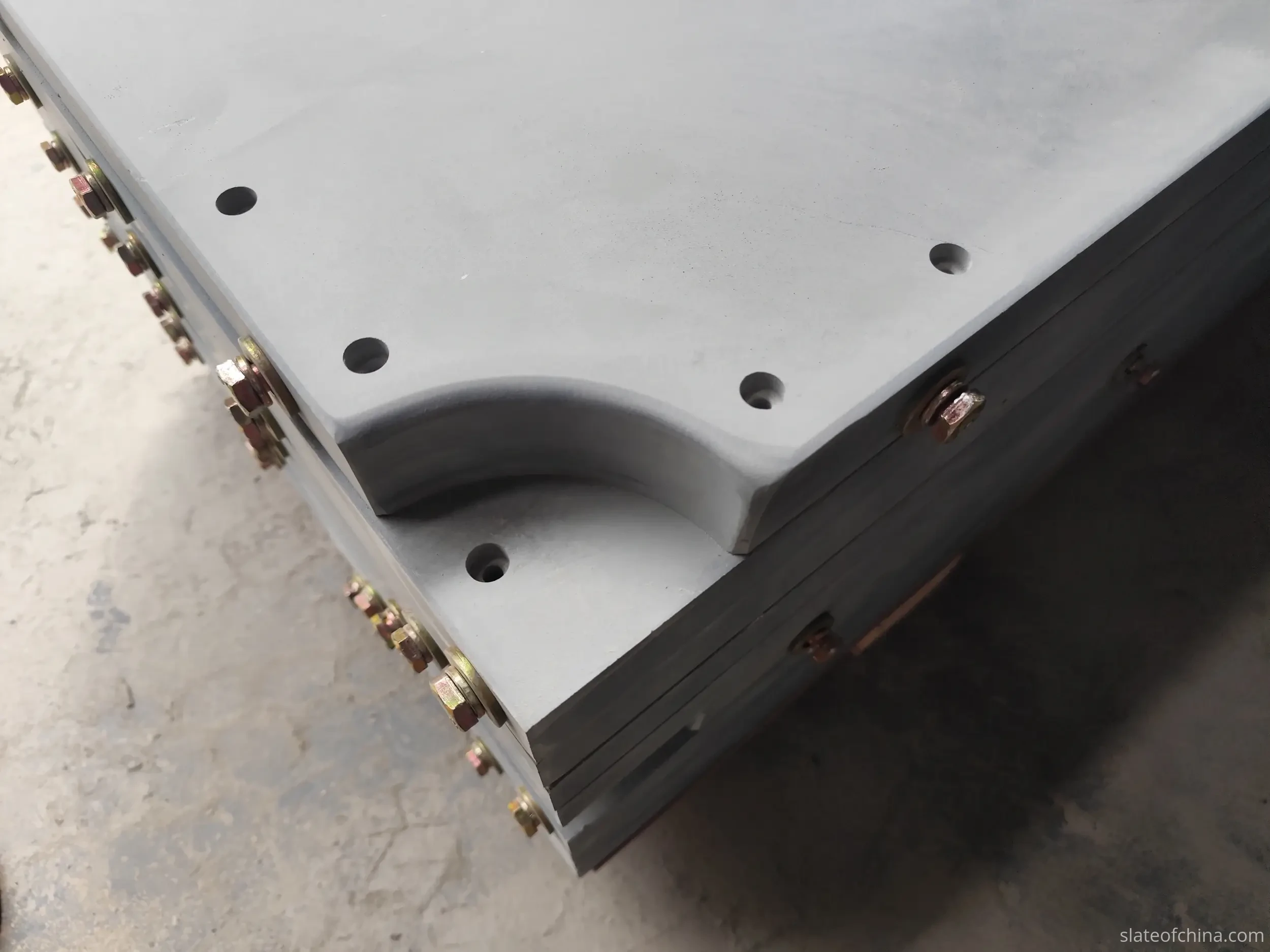Slate Edge — Machined Finish and Thickness Machined edge of a billiard slate panel showing smooth ground finish and panel thickness