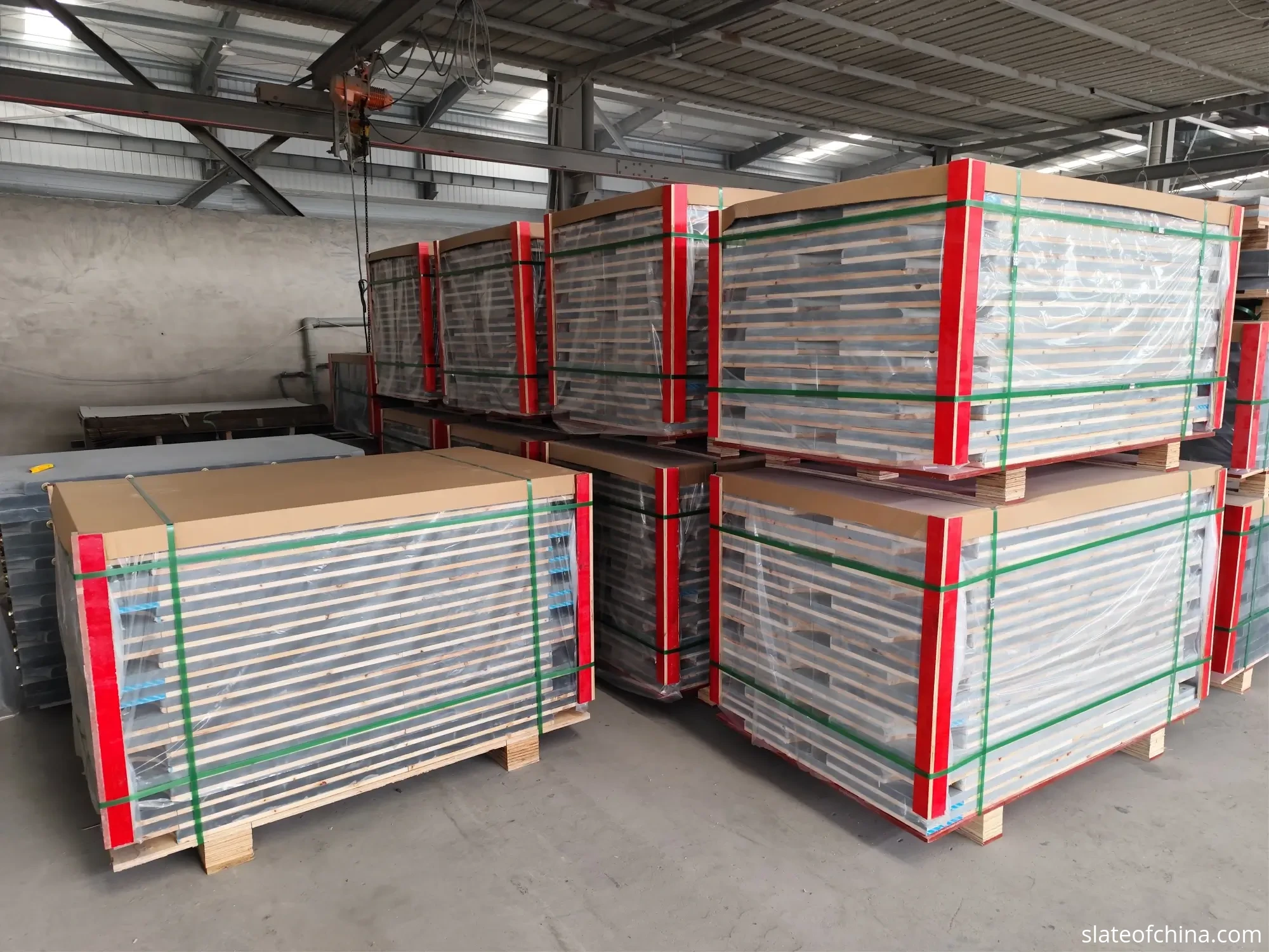 How to Choose Billiard Slate 1 Shrink-wrapped billiard slate pallet stacks in a factory warehouse, ready for dispatch
